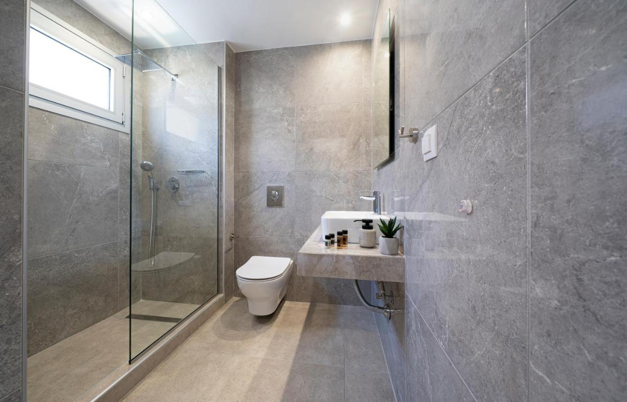 Aelia Seaside Luxury Suites เนอา คาร์วาลี ภายนอก รูปภาพ